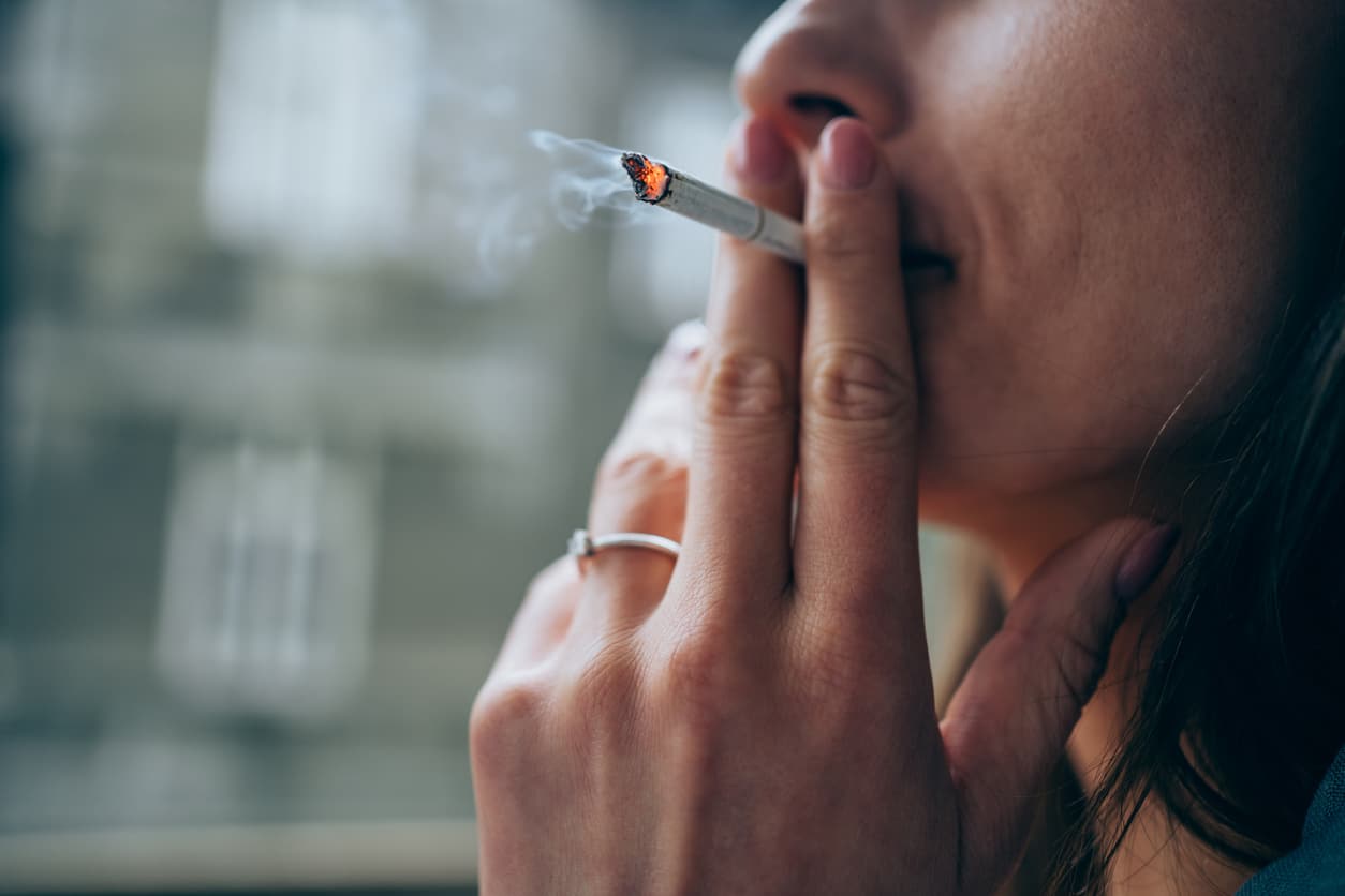 Person smoking a cigarette
