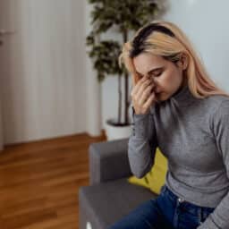 Woman with sinus headache