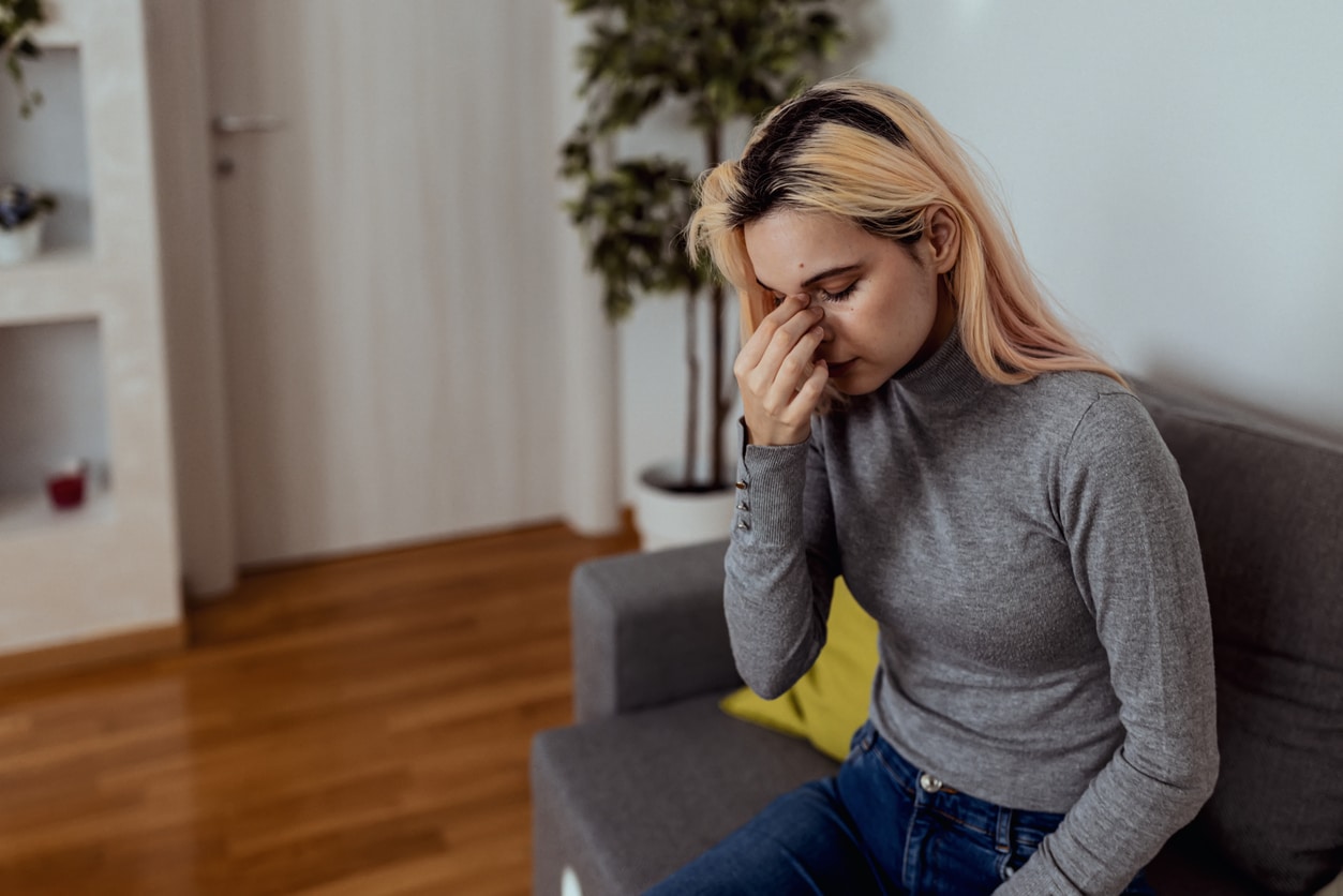 Woman with sinus headache